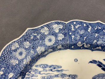 A large oval Chinese blue and white 'Romance of the Western Chamber' dish, Qianlong